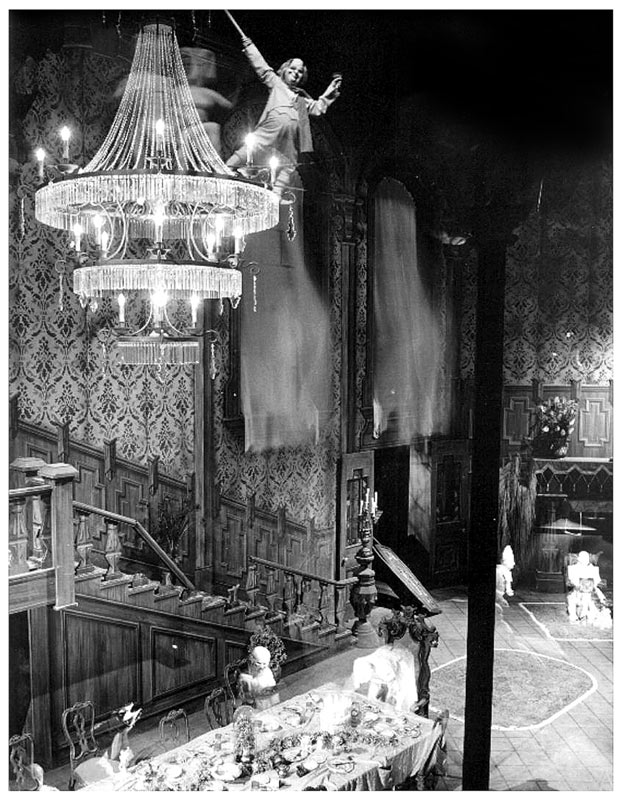 1969-disney-haunted-mansion-press-photo-via-doombuggies